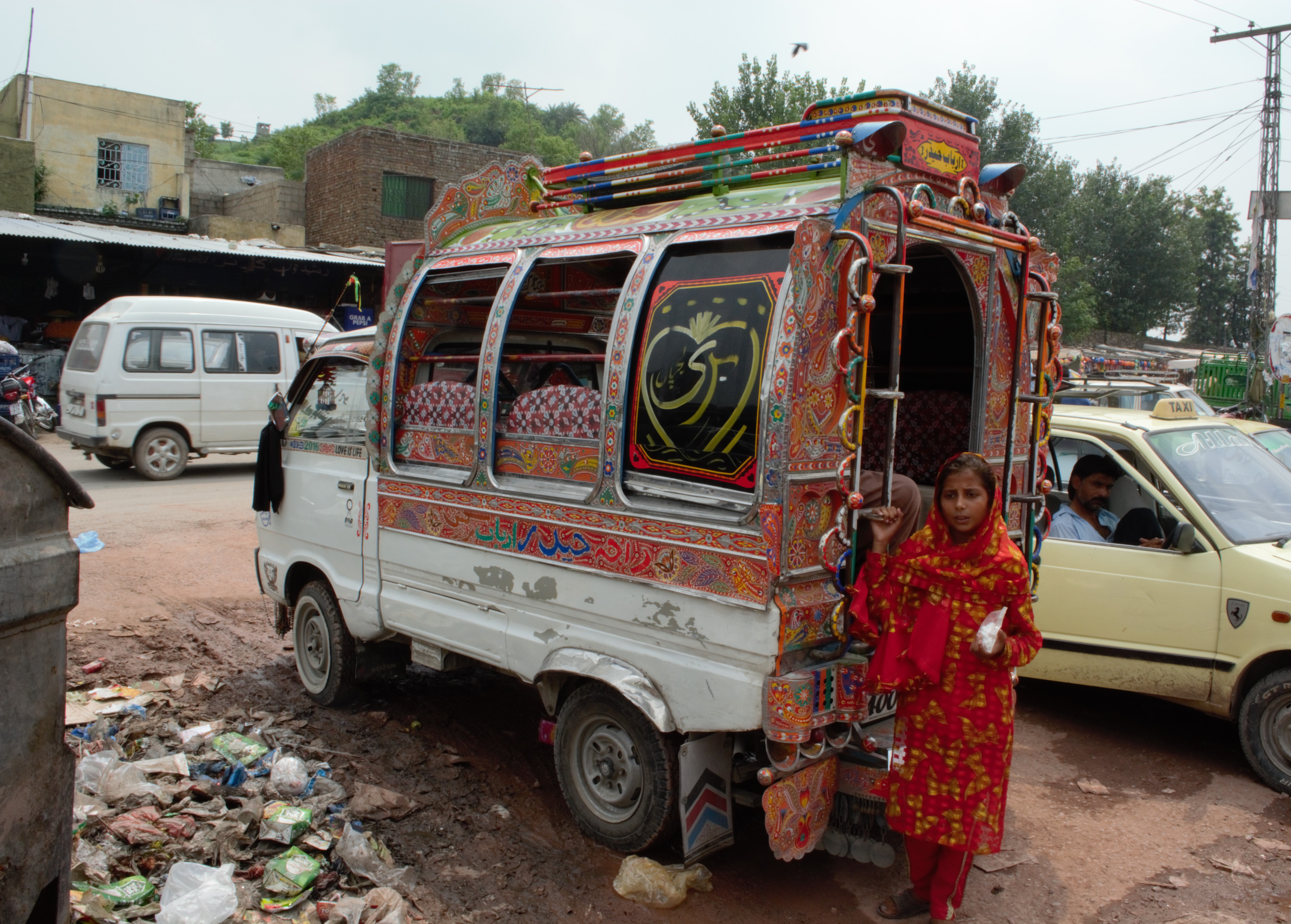 Street Seller near Taxi, Islamabad, Pakistan, ©Fran Smulcheski